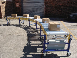 Powered driven roller conveyor extended as well as  curved	 Powered driven roller conveyor extended as well as  curved