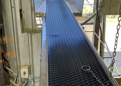 Waste elevator belt